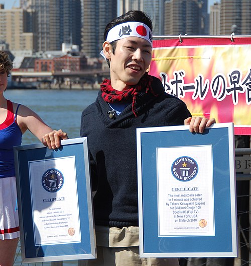Kobayashi with two Guinness World Record certificates (March 2010)