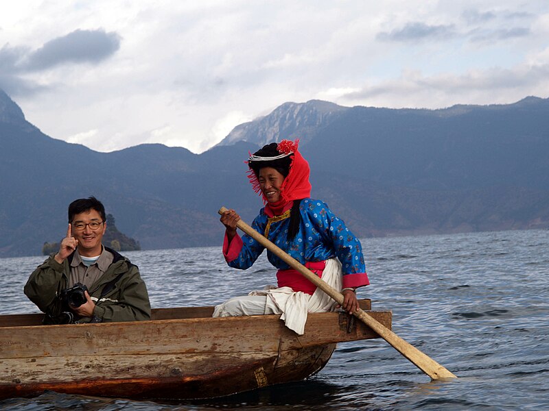 File:Lake Lugu With Moshui-Zu Woman.JPG