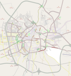 Mapa konturowa Aleppo, po lewej nieco na dole znajduje się punkt z opisem „Stadion Międzynarodowy w Aleppo”