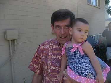 Grant with his granddaughter, in 2009. Michael Grant in 2009.jpg