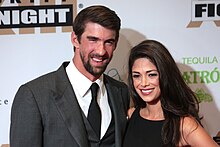 Phelps with his wife, Nicole Johnson Michael Phelps & Nicole Johnson by Gage Skidmore.jpg