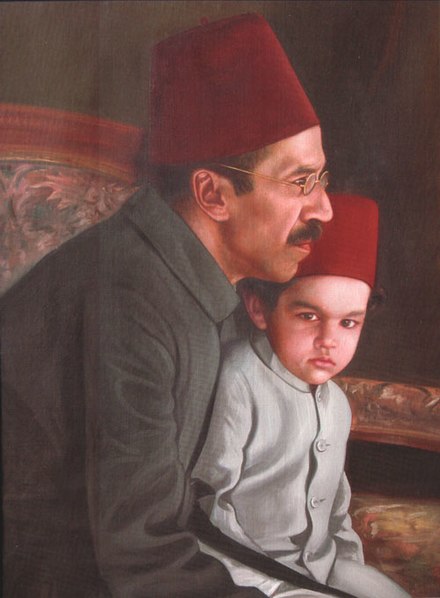 Asaf Jah VII with his grandson Mukarram Jah, both wearing a Sherwani and Rumi Topi
