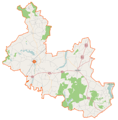 Mapa konturowa powiatu mogileńskiego, po lewej znajduje się punkt z opisem „Mogilno”