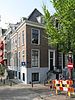 Hoekhuis onder gezamenlijk schilddak met keizersgracht 661