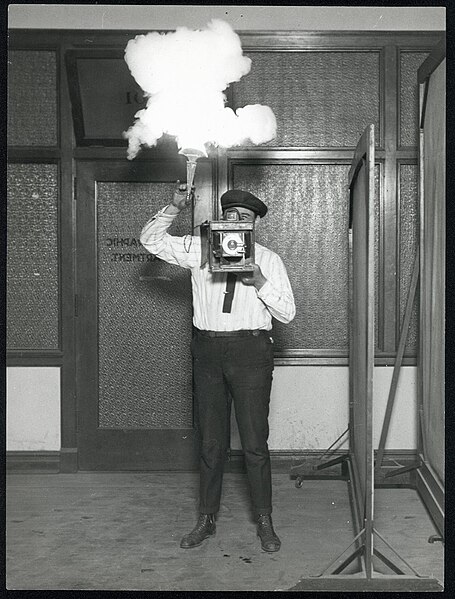 File:Russell Froelich Taking a Photograph with Flash.jpg