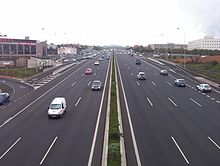 Autopista TF-5 passing by the Guajara Commercial Area and the Central Campus