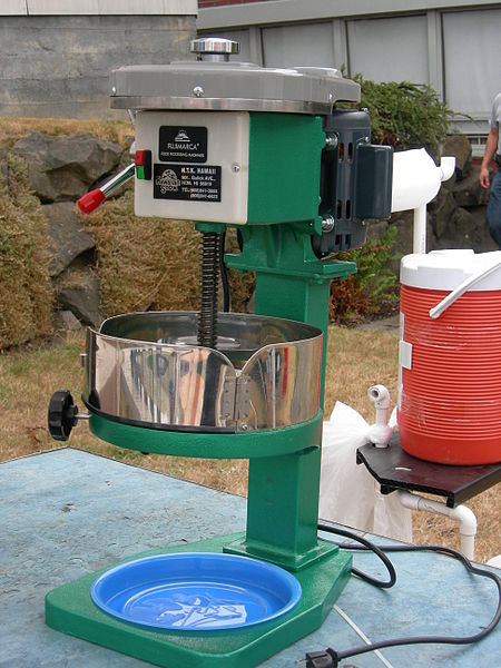 A machine used for shaving ice for shaved ice desserts.