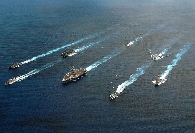 File:Ships from the United States and Canada navigate into formation positions around the US Navy () Nimitz Class Aircraft Carrier USS JOHN C. STENNIS (CVN 74) while underway in the Paci - DPLA - 1e4d98b95634bb3f9738ef62b4339546.jpeg