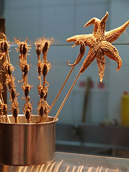 Starfish, scorpions and seahorse skewers, China