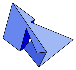 <span class="mw-page-title-main">Szilassi polyhedron</span> Toroidal polyhedron with 7 faces