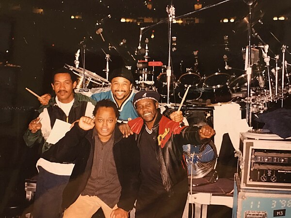 Members from Toots & the Maytals and Dave Matthews Band when performing together in 1998. Paul Douglas (left), Carter Beauford (back), LeRoi Moore (fr