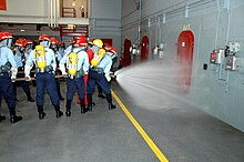 Training at the Recruit Training Command's fire fighting school Training at the Recruit Training Command fire fighting school.jpg