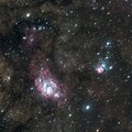 Widefield image of the Trifid Nebula next to Lagoon Nebula