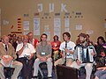 Esperanto: Muzikistoj dum la "malsolena inaŭguro" de la junulara programo (JUK) de la 96-a UK en Kopenhago (2011).