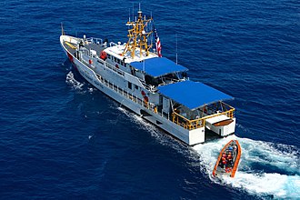 USCGC Raymond Evans (WPC-1110), the tenth Sentinel-class Fast Response Cutter USCGC Raymond Evans uses her stern-launching ramp to deploy her pursuit boat.jpg