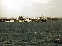 Two of Task Force 58's aircraft carriers at Ulithi atoll in mid-March 1945 USS Hancock (CV-19) and USS Wasp (CV-18) at Ulithi in March 1945.jpg