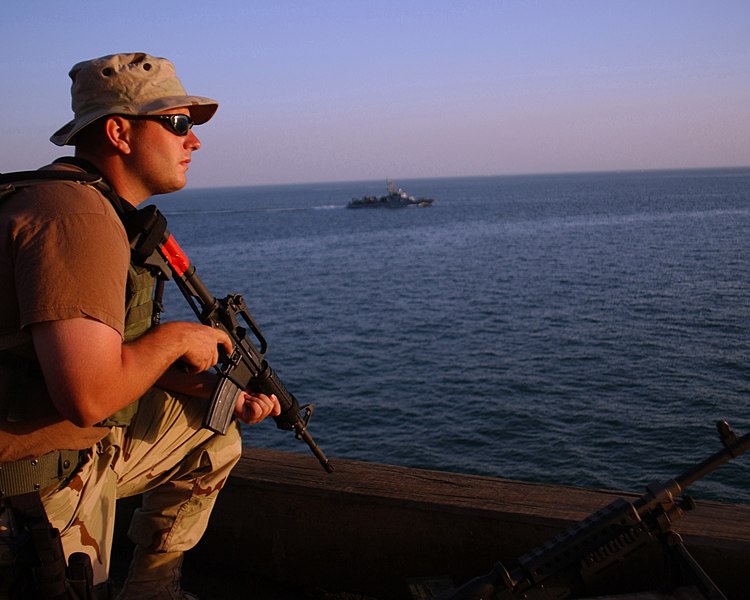 File:US Navy 040613-N-0401E-002 Engineman 2nd Class Joe Pearson stands watch on the North end of Al Basrah Oil Terminal (ABOT).jpg