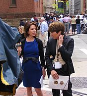WBAL-TV, Channel 11 longtime reporters Deborah Weiner and Jayne Miller prepare for a live shot outside old St. Paul's Church (Episcopal) at North Charles and East Saratoga Streets during the funeral there of former Baltimore City Mayor, Maryland Governor, and Comptroller William Donald Schaefer, April 27, 2011 Wbal tv live shot.JPG