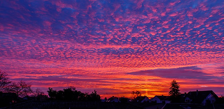 Atmospheric refraction at sunrise