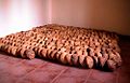 Los panes de la caridad («molletes») en Mas del Olmo, Ademuz (Valencia), dispuestos para su bendición, año 2011.