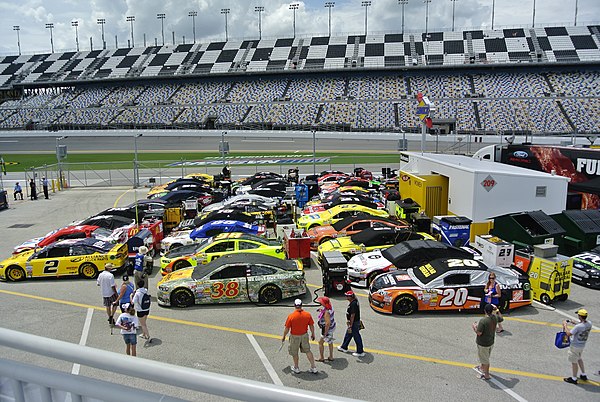 Cars lined up in the garage for the race.