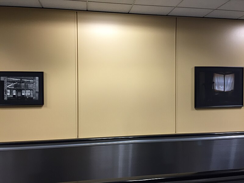 File:2015-04-13 23 41 11 Photographs on display alongside the people mover between Concourse B and Concourse C at Salt Lake City International Airport, Utah.jpg