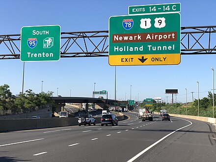 View south along the New Jersey Turnpike/Interstate 95 approaching the exit for Interstate 78, U.S. Route 1 and U.S. Route 9 in Newark