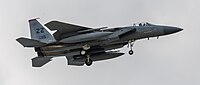 A US Air Force F-15C Eagle, tail number 85-0115, on final approach at Kadena Air Base in Okinawa, Japan