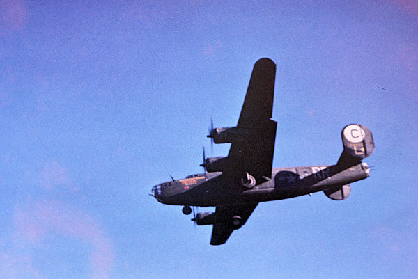 A B-24 Liberator of the 389th Bomb Group returns to RAF Hethel.