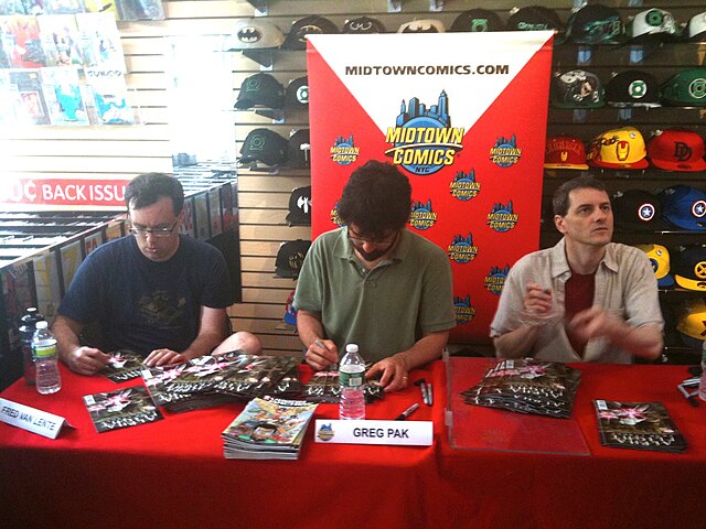 Fred Van Lente, Greg Pak and Mark Paniccia at a signing for Alpha Flight, vol. 4 #1 at Midtown Comics Downtown in Manhattan, June 18, 2011.