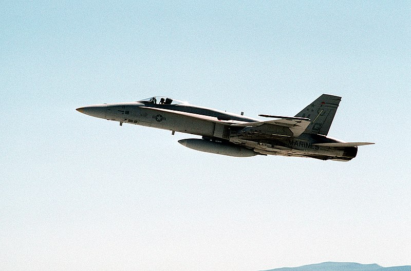 File:A left side view of a Marine Fighter Attack Squadron 321 (VMFA-321) F-A-18A Hornet aircraft taking off. The Hornet is armed with four LAU-68 2.75-inch rocket pods and a CATM-88 HARM - DPLA - b14722799b4c7b8cc79cd74bea25e494.jpeg