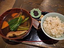 An Ainu-style meal with venison and mountain vegetable soup (yuk ohaw
), fermented salmon liver (mefun
) and rice mixed with grains. Ainu Set Meal.jpg