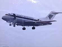 Fokker F28 Fellowship with door open in September 1983 Airlines of Western Australia F28 VH-FKA door open Perth 1983.jpg