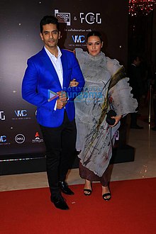 Dhupia with husband Angad Bedi in 2019 Angad Neha.jpg