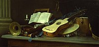 Varios instrumentos musicales: una guitarra, una trompeta y otros con un libro abierto