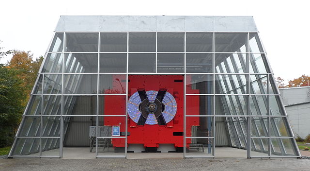 The metal red chassis of the ARGUS detector exposed in a dedicated glass hall