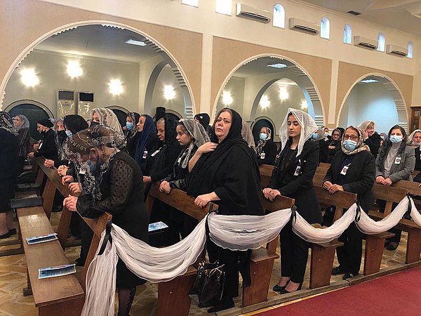 Chaldean Catholics praying in a Holy Qurbana in Baghdad, Iraq