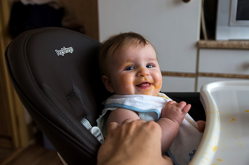 File:Baby smiling and playing, Baby eating, Peg Perego baby girl, Moscow, Russia.jpg