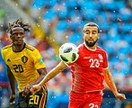 Naïm Sliti et Dedryck Boyata lors d'un match entre la Tunisie et la Belgique.