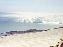 Belozem Hill, with Balkan Snowfield in the foreground, and Emona Anchorage and Aleko Point in the background.