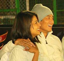 Bhaichung Bhutia, with his wife, at Mohun Bagan Ground in 2009.