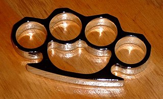 Brass knuckles Weapon used in hand-to-hand combat