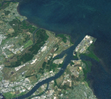 Brisbane's seaport, Port of Brisbane on Fisherman Island, and Brisbane Airport from space, Landsat montage BrisAirportFishermanIslandNth.png