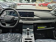 Chery Tiggo 8 Plus Kunpeng interior at a Chery dealership.jpg