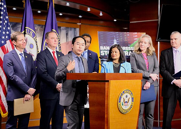 Neguse at a press conference supporting a ban on Congressional stock trading in May 2023.