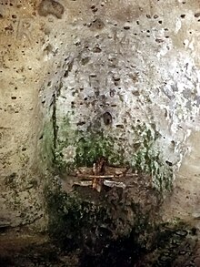 Recess, thought to have been used in worship, in west wall of the hermitage. Dale Abbey 2019 Hermitage03.jpg