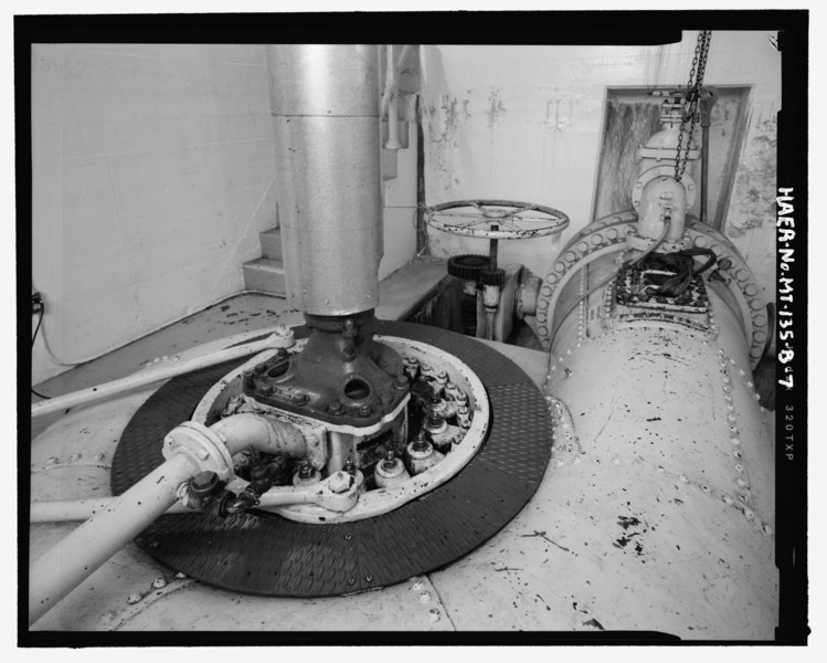 File:Detail of exciter turbine showing shaft, scroll case, servo-motor and operating ring (left foreground) and hand wheel for butterfly valve (right background) - Morony Hydroelectric HAER MT-135-B-7.tif