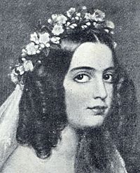 Black and white copy of a painted portrait showing the head and shoulders of a woman with dark, curled hair, large eyes and wearing a circlet of flowers and veil on her head