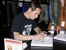 Shepard Fairey at a book signing for Supply & Demand: The Art of Shepard Fairey Fairey.jpg