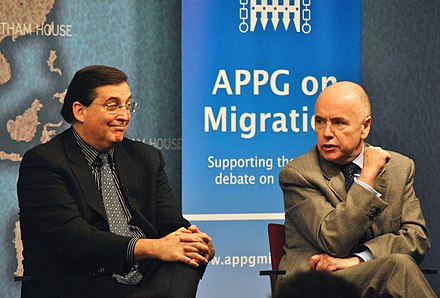 Dromey (right) with Frank Sharry at Chatham House in 2011